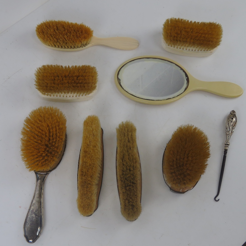 An HM silver dressing table set comprising hair brush and three clothes brushes. - Image 2 of 4