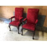 A fine pair of mahogany high back hall chairs.