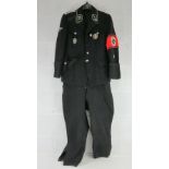 A re-enactor's SS German WWII tunic with insignia,