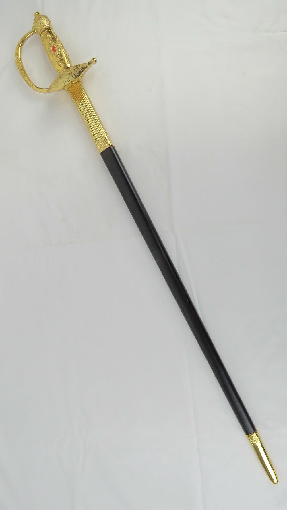 A reproduction WWII German dress sword with scabbard.