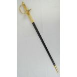 A reproduction WWII German dress sword with scabbard.