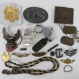 A quantity of assorted US Military, dog tags and insignia.