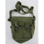 An army green canvas magazine bag, no apparent stamps upon.