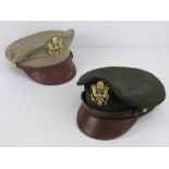 Two reproduction WWII US Army Air Force peaked caps, one being size 7 3/4,