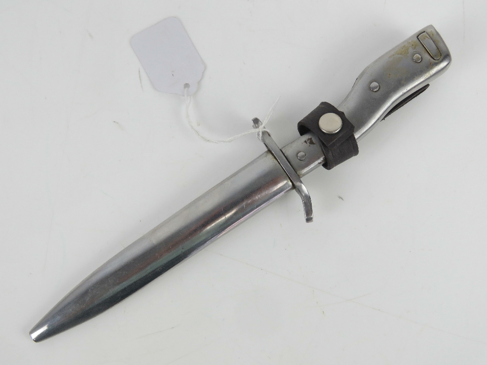 A German bayonet having steel grip and scabbard with leather frog,