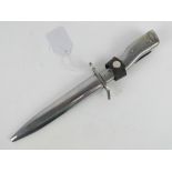 A German bayonet having steel grip and scabbard with leather frog,