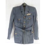 A WWII RAF Pilot Officer's No1 dress jacket having brass buttons and cloth badge upon,