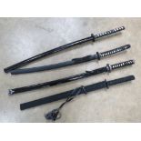 Three decorative Katana with scabbards, measuring 41, 42 and , 44 inches respectively.