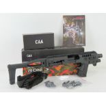 A Micro Roni Conversion System for the Glock 19 and Glock 23. CAA manufacture. New in box.