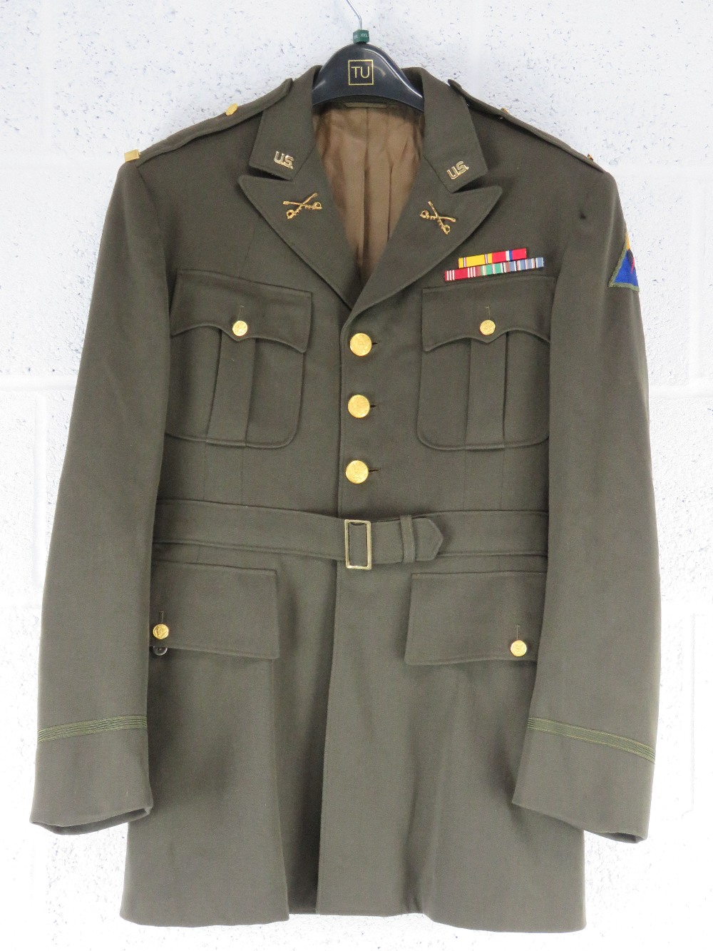 A US 7th armoured division Dress Jacket with insignia.