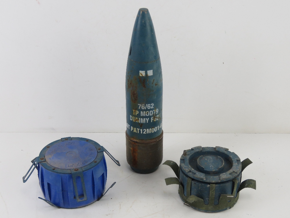 An inert British 76mm Malara Naval TP MOD79 cannon projectile with dummy fuse.