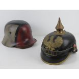 A reproduction WWI German pickelhaube helmet and liner,