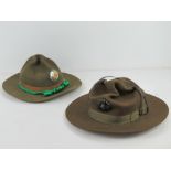 A vintage US army drill sergeant's campaign hat together with a US Marine Campaign hat (size 58).