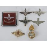 A quantity of assorted British Paratrooper badges inc cap badges. Seven items.