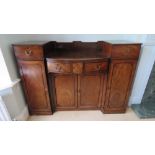 A good Georgian mahogany buffet sideboard having barrel front,