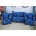 A two seater Knole drop arm sofa with loose cushions,