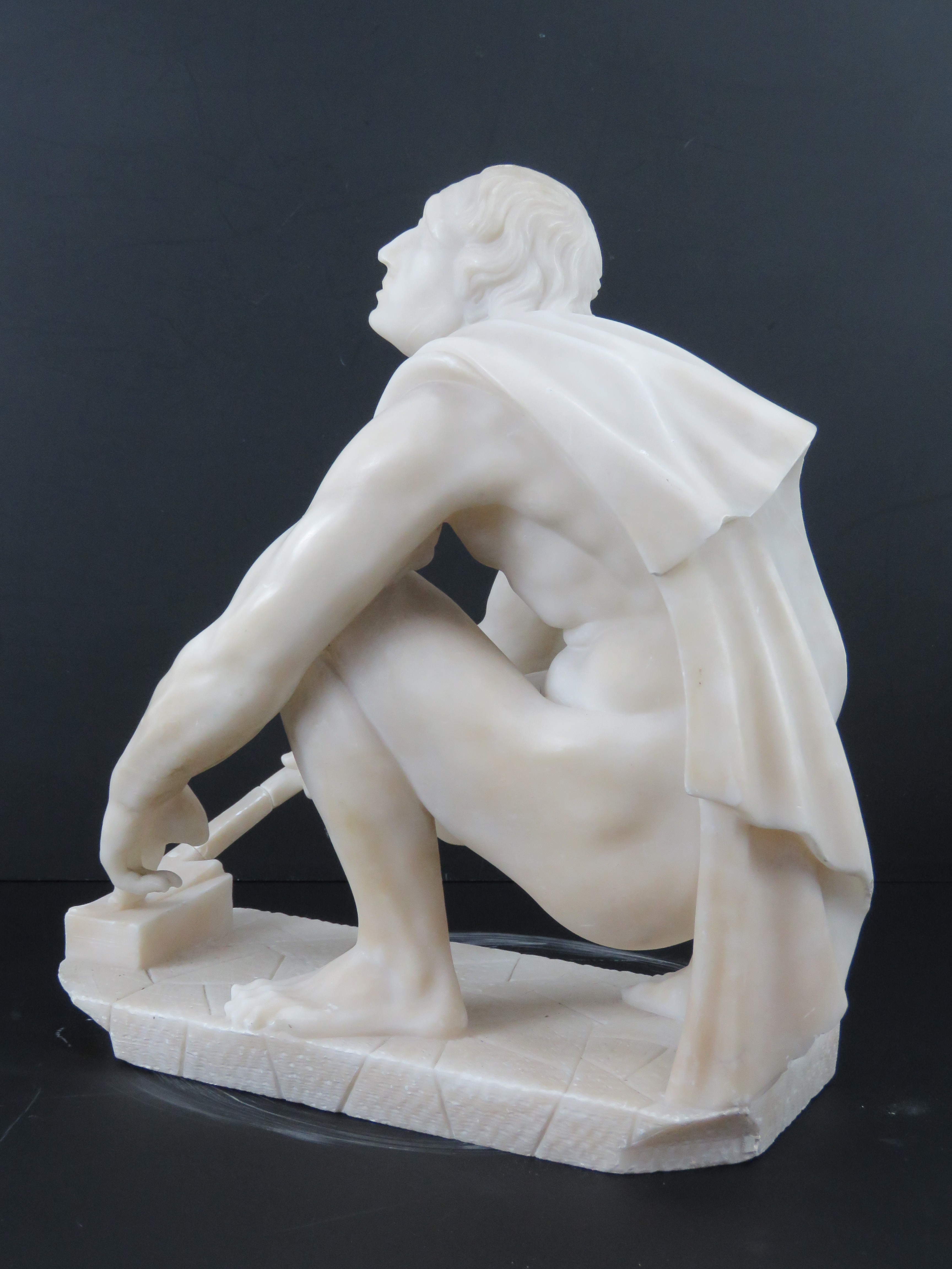 A well carved alabaster sculpture; Grecian school, kneeling man. - Image 4 of 5