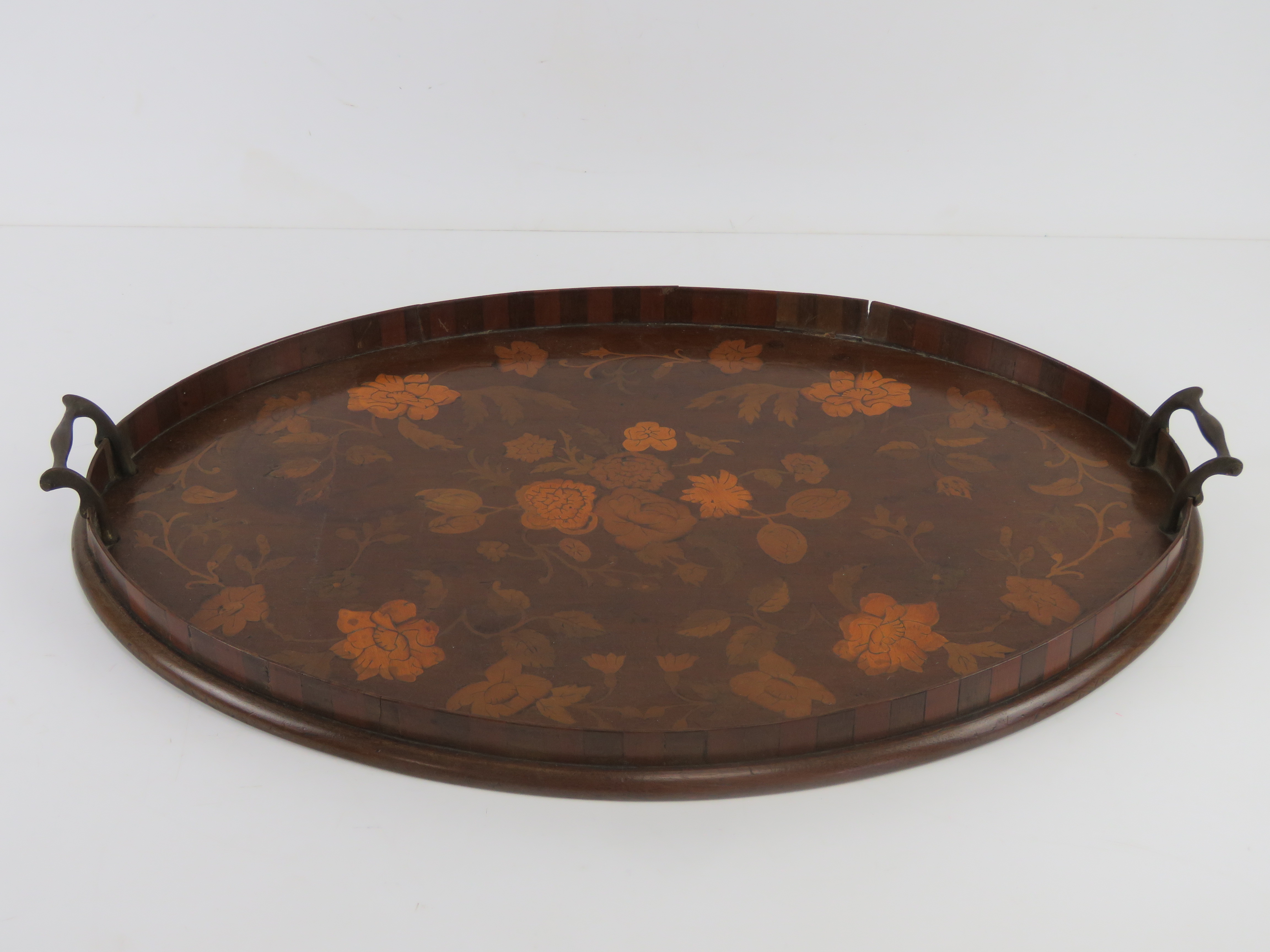 An inlaid mahogany serving tray having intricate floral design, brass end handles, - Image 2 of 3