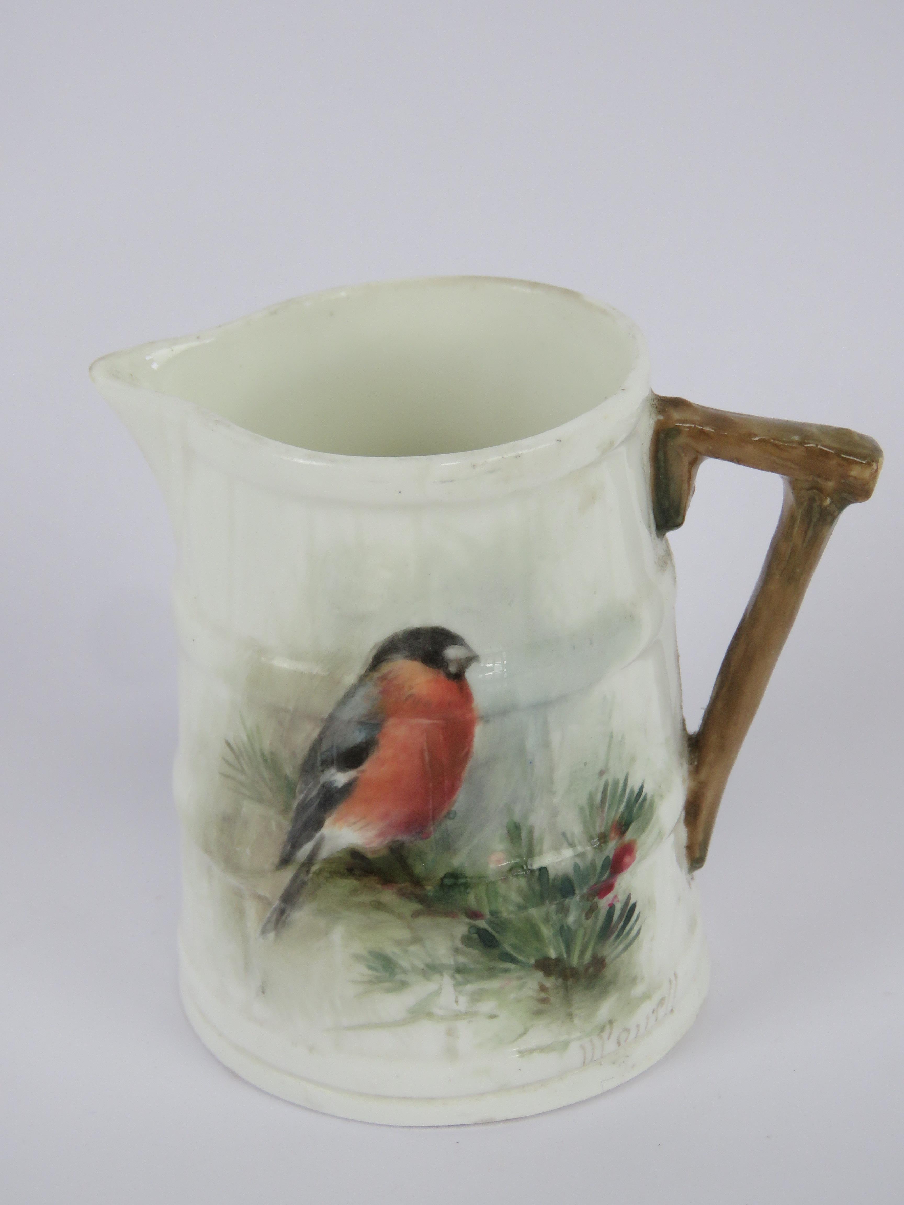 A Royal Worcester ornithological barrel jug, Bullfinch, painted by William Powell, signed,