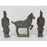 A pair of terracotta Chinese Warrior figurines, each standing 17cm high,