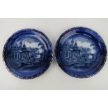 A good pair of blue and white part gilded scenic cabinet plates, un-named, 27cm dia.