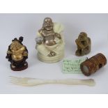 A carved soapstone monkey, a small wooden netsuke inset with stag antler and opposing compass,