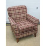 A contemporary armchair by Next in tartan fabric, approx 84 x 84 x 84cm.