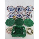 A set of five Spode New Stone Oriental influence plate together with a quantity of green Wedgwood