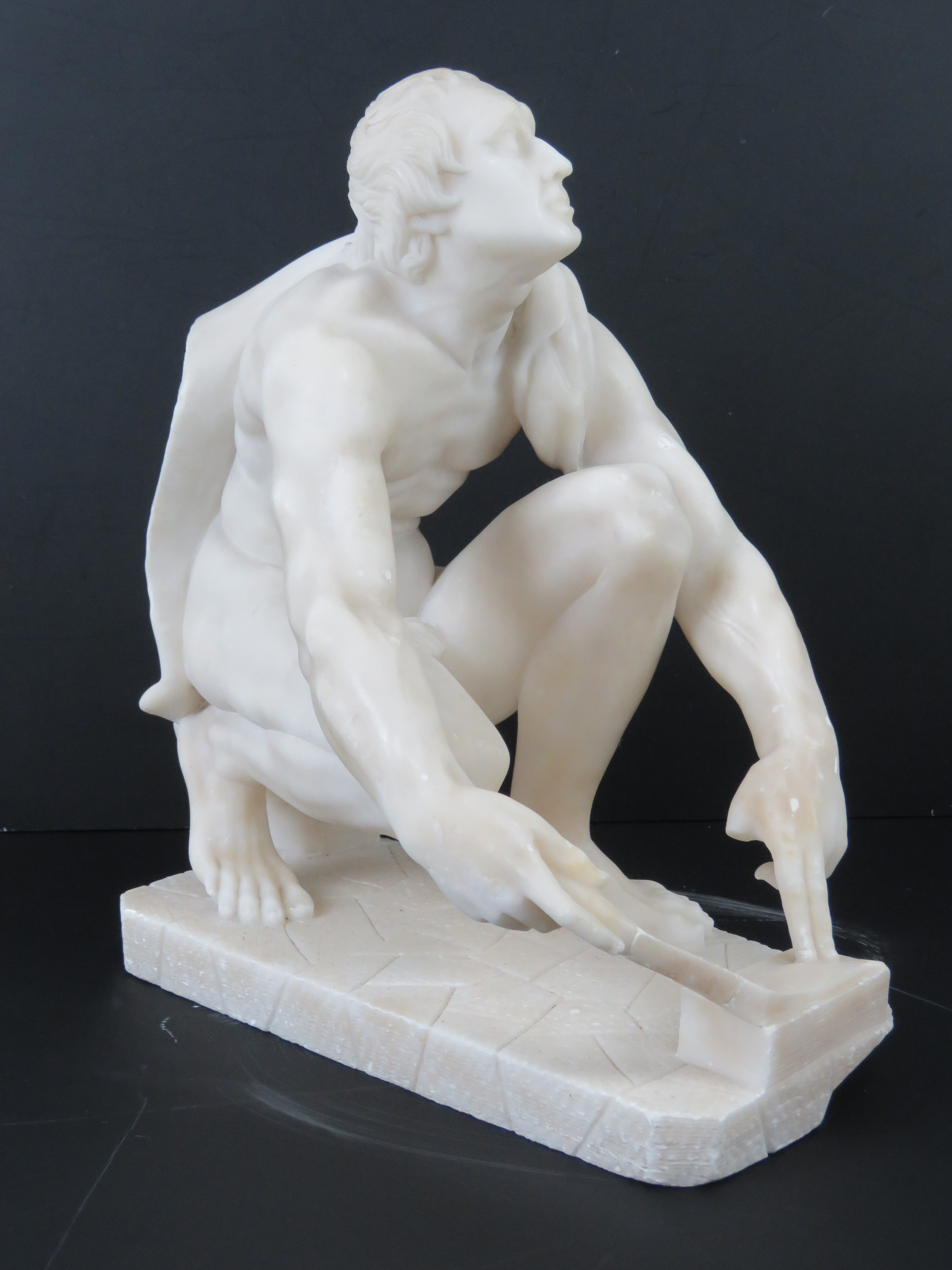 A well carved alabaster sculpture; Grecian school, kneeling man. - Image 2 of 5