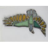 A contemporary leaded glass hanging Peace Dove, 26cm wide.