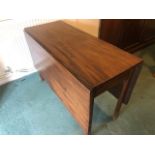 A Victorian mahogany drop leaf table having square cut legs, 137 x 106cm extended, 70cm high.
