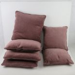 A set of six purple velvet cushions, four large, two small, with liner.