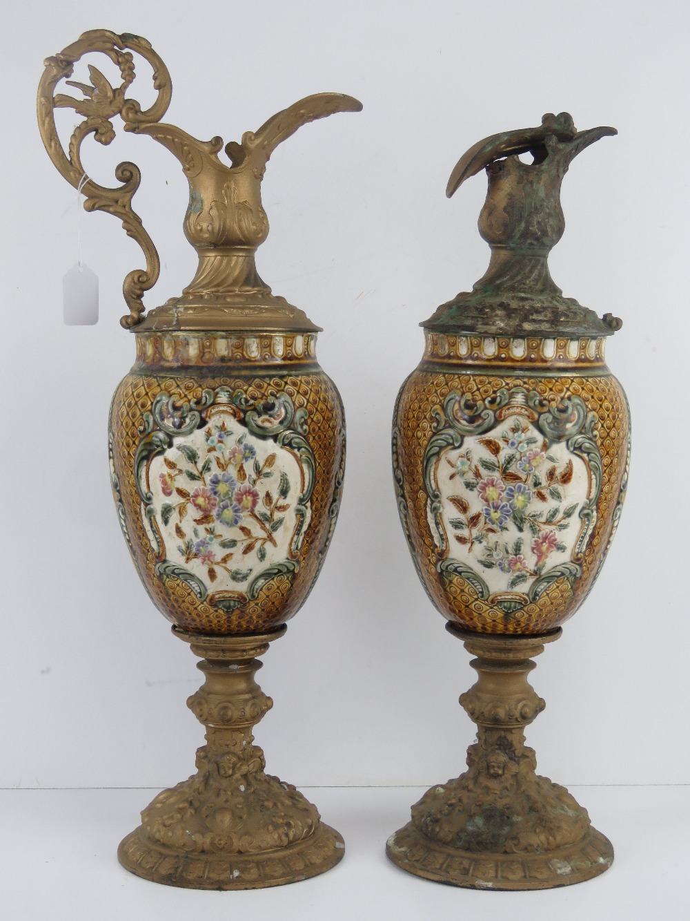 A pair of large 19th century ormolu and ceramic urns,