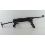 A deactivated M56 Sub Machine Gun. With cert.