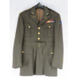 A US 7th armoured division Dress Jacket with insignia.