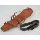 A reproduction WWI G98 leather breach cover and sling.