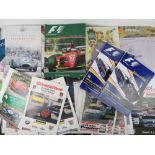 A quantity of race programmes, passes, marshal bibs etc.