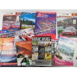 A quantity of race programmes, passes, marshal bibs etc.