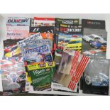 A quantity of race programmes, passes, marshal bibs etc.