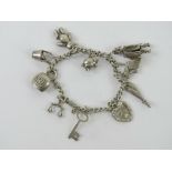 A silver charm bracelet having eleven ch