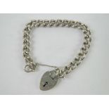 A heavy HM silver charm bracelet having