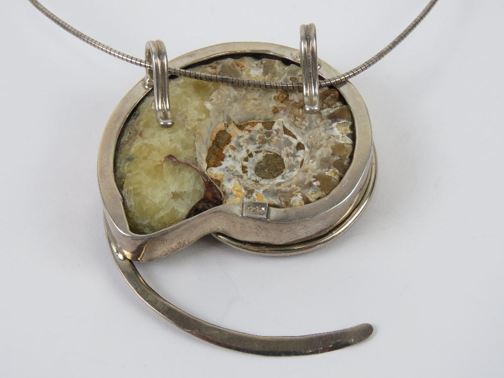 A large and impressive silver mounted ammonite fossil having two pendant loops and - Image 3 of 3