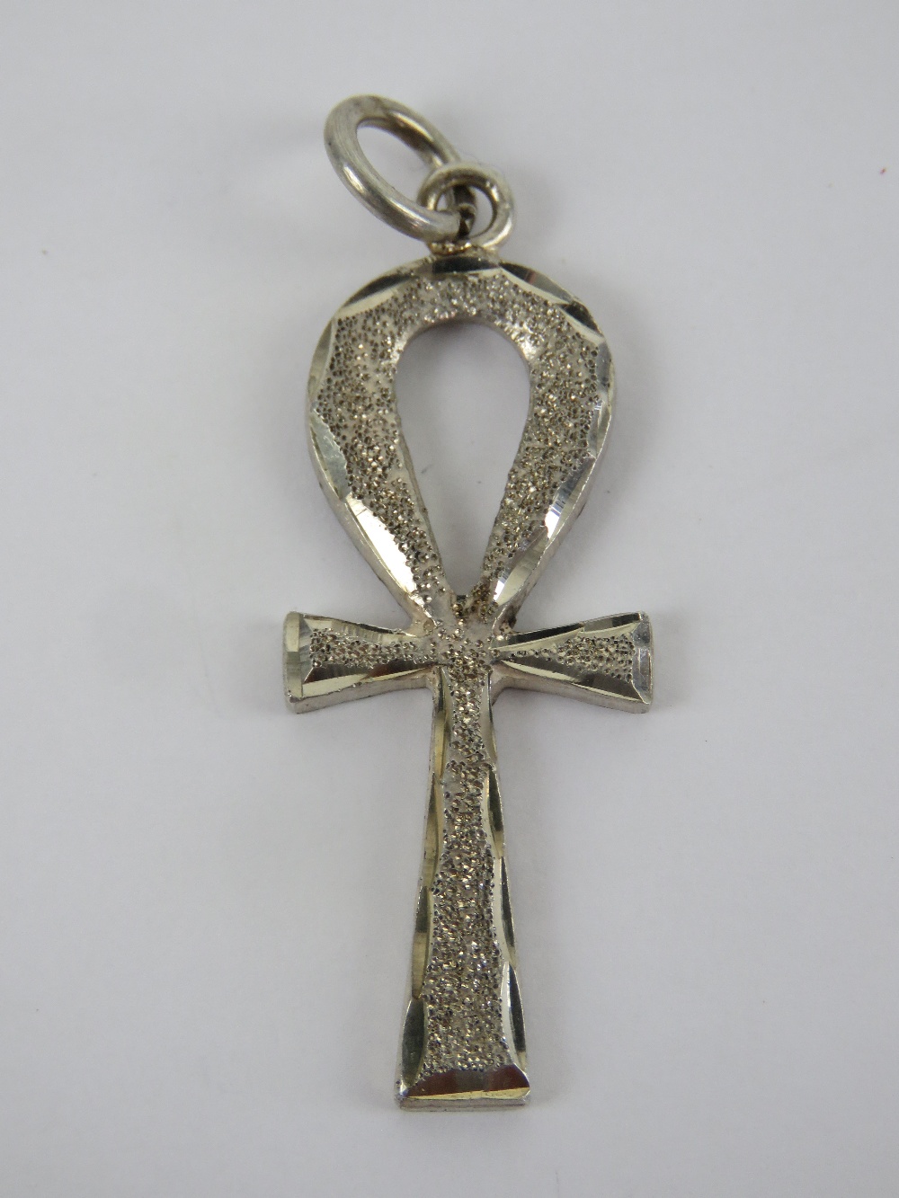 An Egyptian Ankh pendant having Arabic h