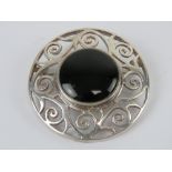 A large Celtic style silver and onyx pla