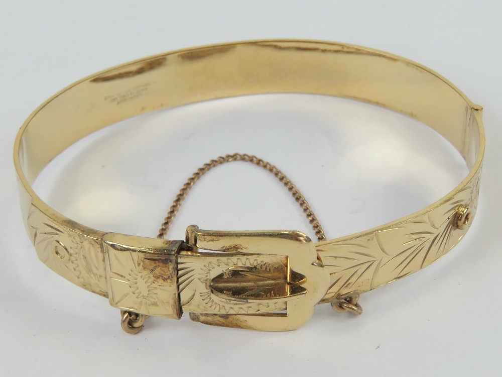 A finely made hinged bangle in the form