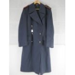 A blue post war German great coat.
