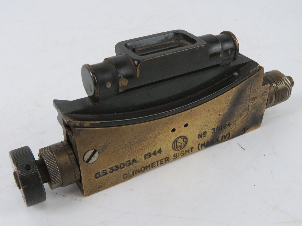 A brass clinometer sight mark IV dated 1944 having broad arrow upon and numbered 36124.