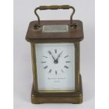 A five glass brass carriage clock by Matthew Norman London having Swiss movement, swing handle over,