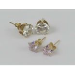 Two pairs of stud earrings each having 9ct gold butterfly backs, no apparent hallmarks.