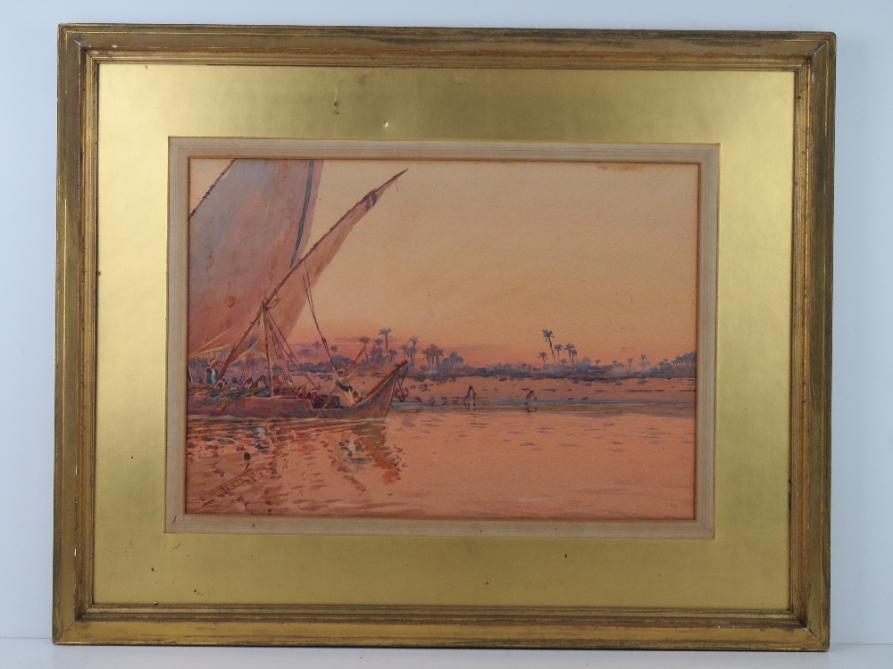 Watercolour; sailboat on the River Nile, palm trees and sunset beyond, signed lower left,